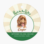 Bark in the Park pet keychain showing a colored pencil portrait of a dog named Cooper inside the Bark in the Park San Jose event badge, with a punched hanging hole at the top