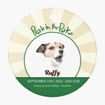 Bark in the Park pet keychain showing a colored pencil portrait of a dog named Ruffy inside the Bark in the Park San Jose event badge, with a punched hanging hole at the top