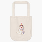 Natural cotton tote bag printed with a watercolor gray and white cat in a party hat, wearing a bandana that reads "Pinkie".