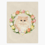Cream fleece blanket printed with a fluffy cream Persian cat framed by a ring of watercolor tulips, the pet's name in a heart below.