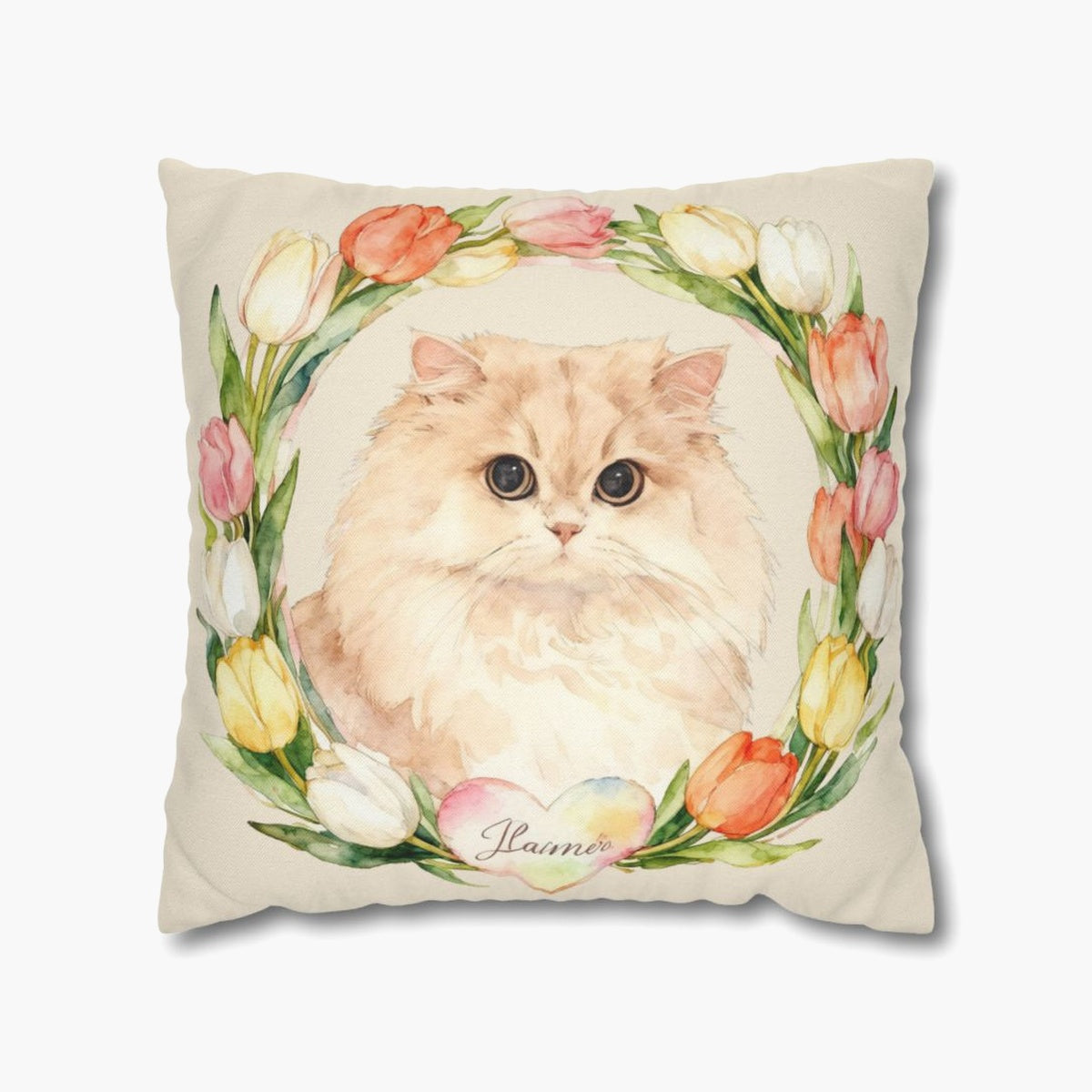 Watercolor cream Persian cat framed by a ring of pink, white and red tulips on a cream throw pillow, the pet's name in a pastel heart below.