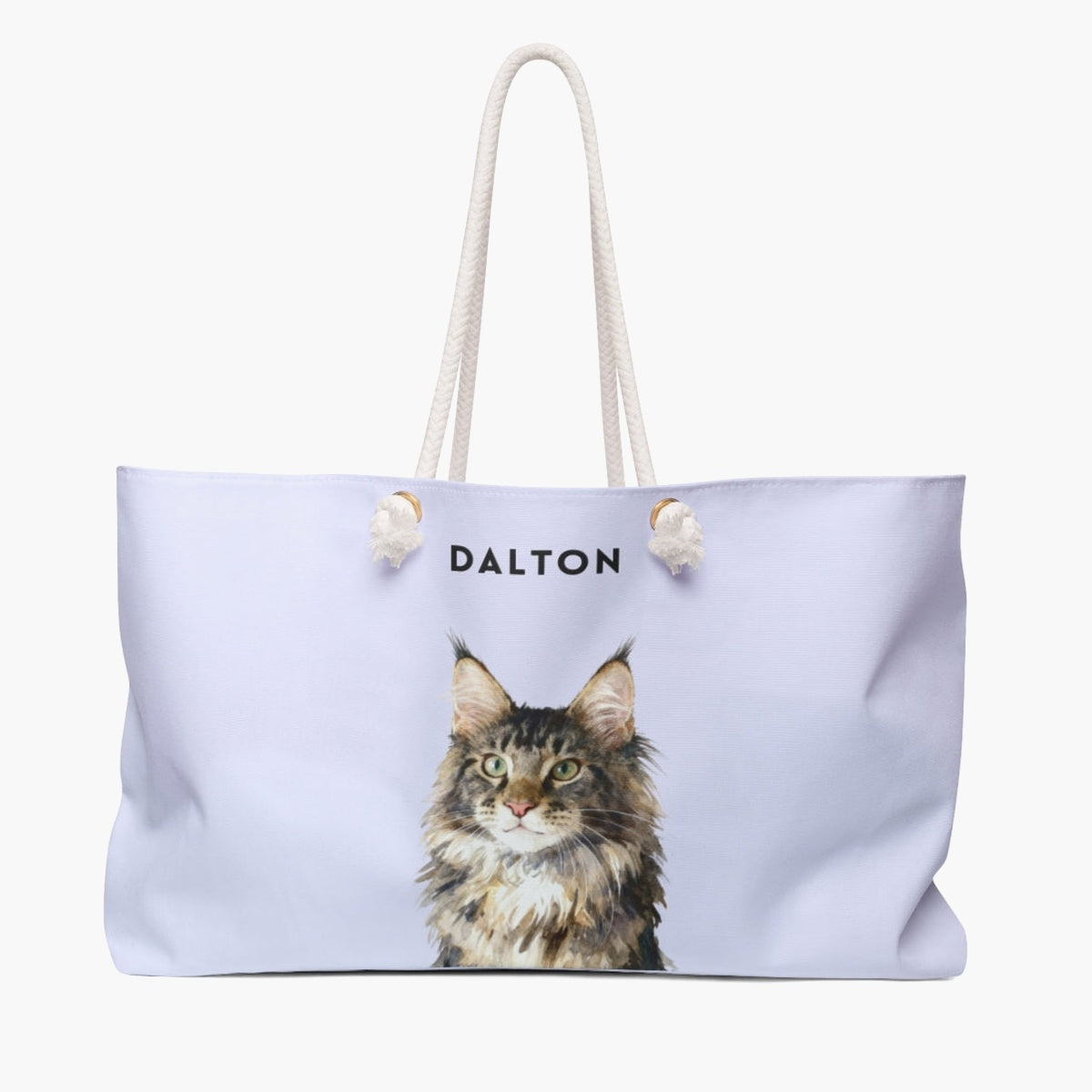 Watercolor portrait of a green-eyed Maine Coon cat on a lavender weekender bag, with the name DALTON printed above.