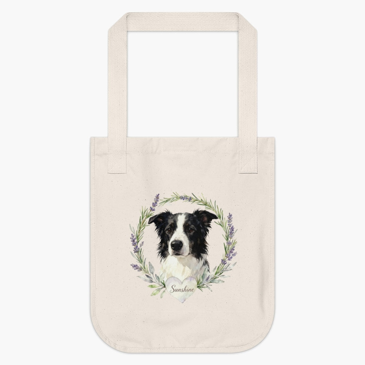 Natural cotton tote bag printed with a rosemary and lavender wreath around a black and white border collie, with "Sunshine" on a heart.