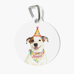 Round white pet tag on a metal clasp, printed with a watercolor brown and white dog in a party hat and a confetti bandana reading Hopper.
