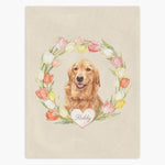 Cream fleece blanket printed with a golden retriever framed by a ring of watercolor tulips, the pet's name in a white heart below.