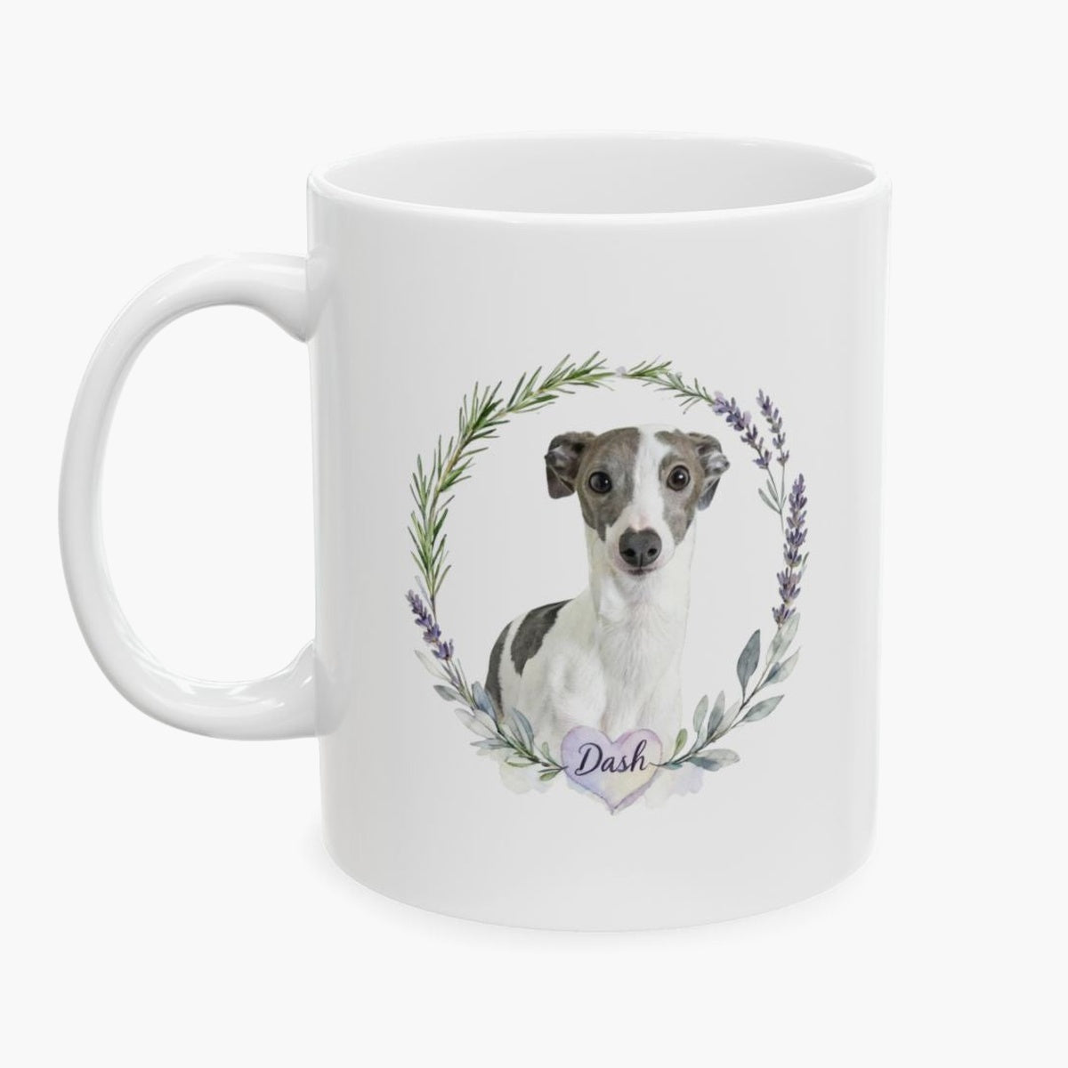 Watercolor portrait of a gray and white whippet inside a rosemary and lavender wreath on the 11 oz white mug, with the name Dash below.