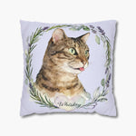 Watercolor brown tabby cat in profile inside a wreath of lavender and herbs on a lilac pillow, with the name "Whiskey" in a heart below.