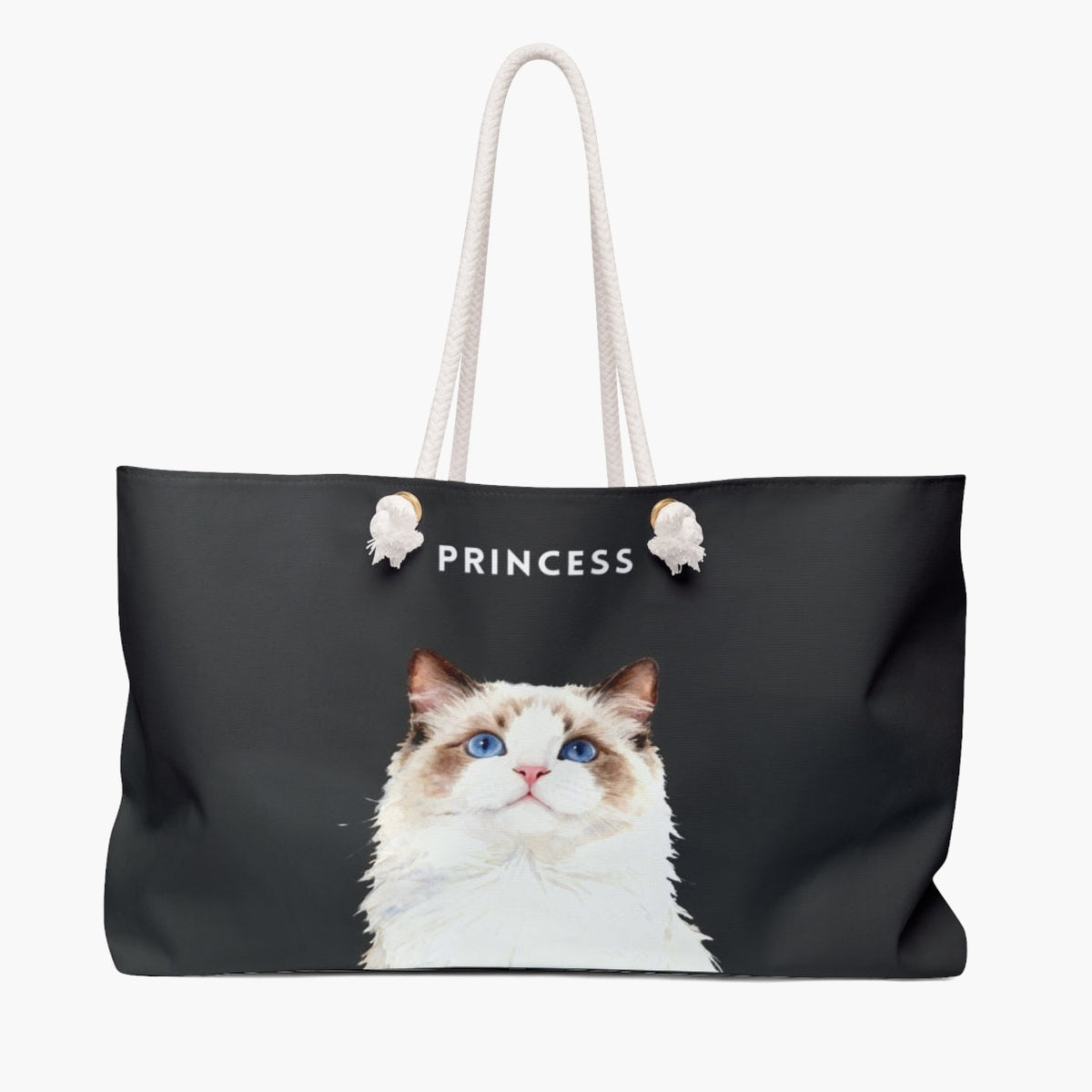 Watercolor portrait of a blue-eyed ragdoll cat on a charcoal gray weekender bag, with the name PRINCESS printed above in white.