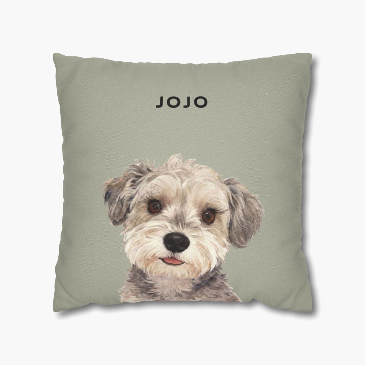 Watercolor portrait of a scruffy gray and cream terrier mix on a sage green throw pillow, with the name "JOJO" above in black capitals.