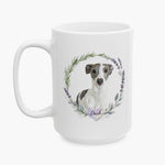 Watercolor portrait of a gray and white whippet in a rosemary and lavender wreath on the larger white mug, with the name Dash below.