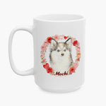 Fluffy husky-type puppy inside a wreath of roses and hearts on the larger white mug, with the name Mochi in dark red script.
