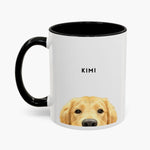 Watercolor golden retriever peeking up over the bottom edge of a white 11 oz mug with a black handle and inner glaze, name "KIMI" above.