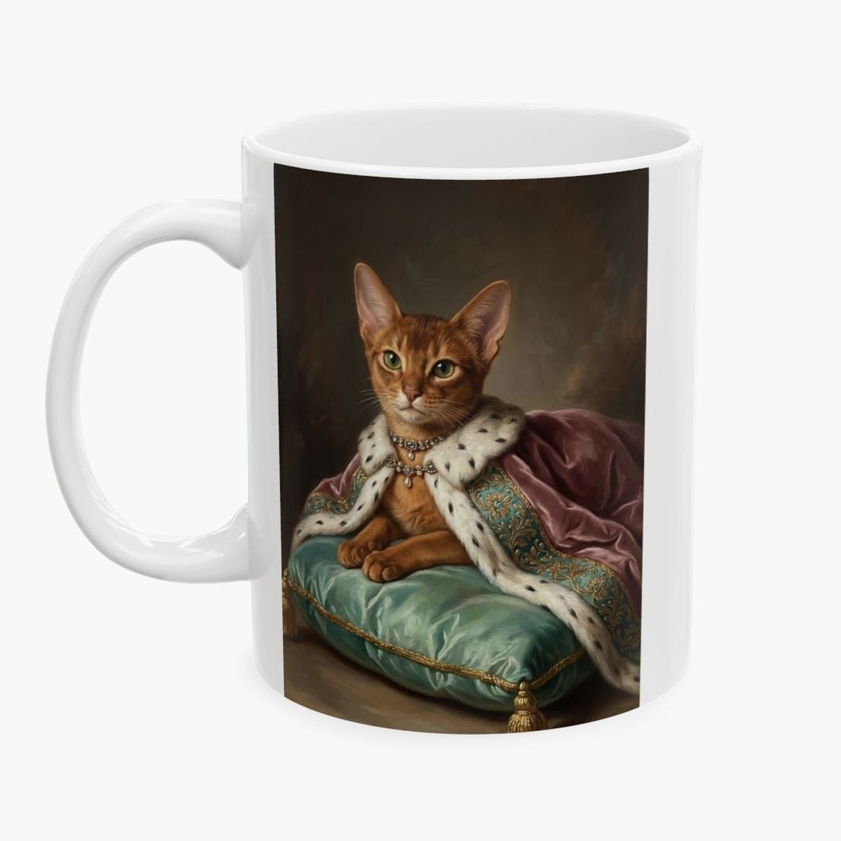 Oil painting of a ginger Abyssinian cat in a jeweled collar and pink ermine-trimmed royal cloak, lounging on a mint silk cushion, wrapped around a white 11 oz mug.