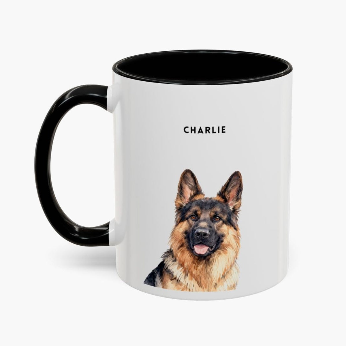 Watercolor head-and-shoulders portrait of a German shepherd on a white 11 oz mug with a black handle and inner glaze, name "CHARLIE" above.