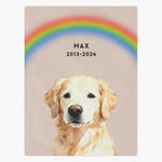 Watercolor golden retriever under a painted rainbow on a dusty pink fleece blanket, with "MAX" and the dates "2013-2024" below the arc.
