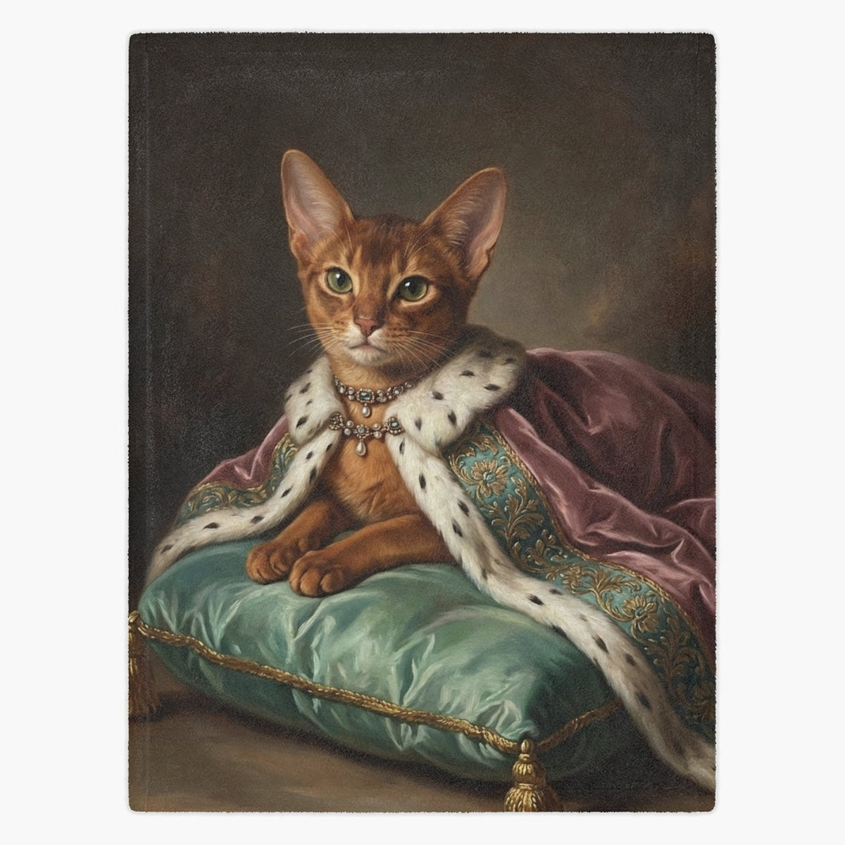Fleece blanket printed with an oil-painting portrait of a ginger Abyssinian cat in an ermine robe and jeweled necklace on a green cushion.