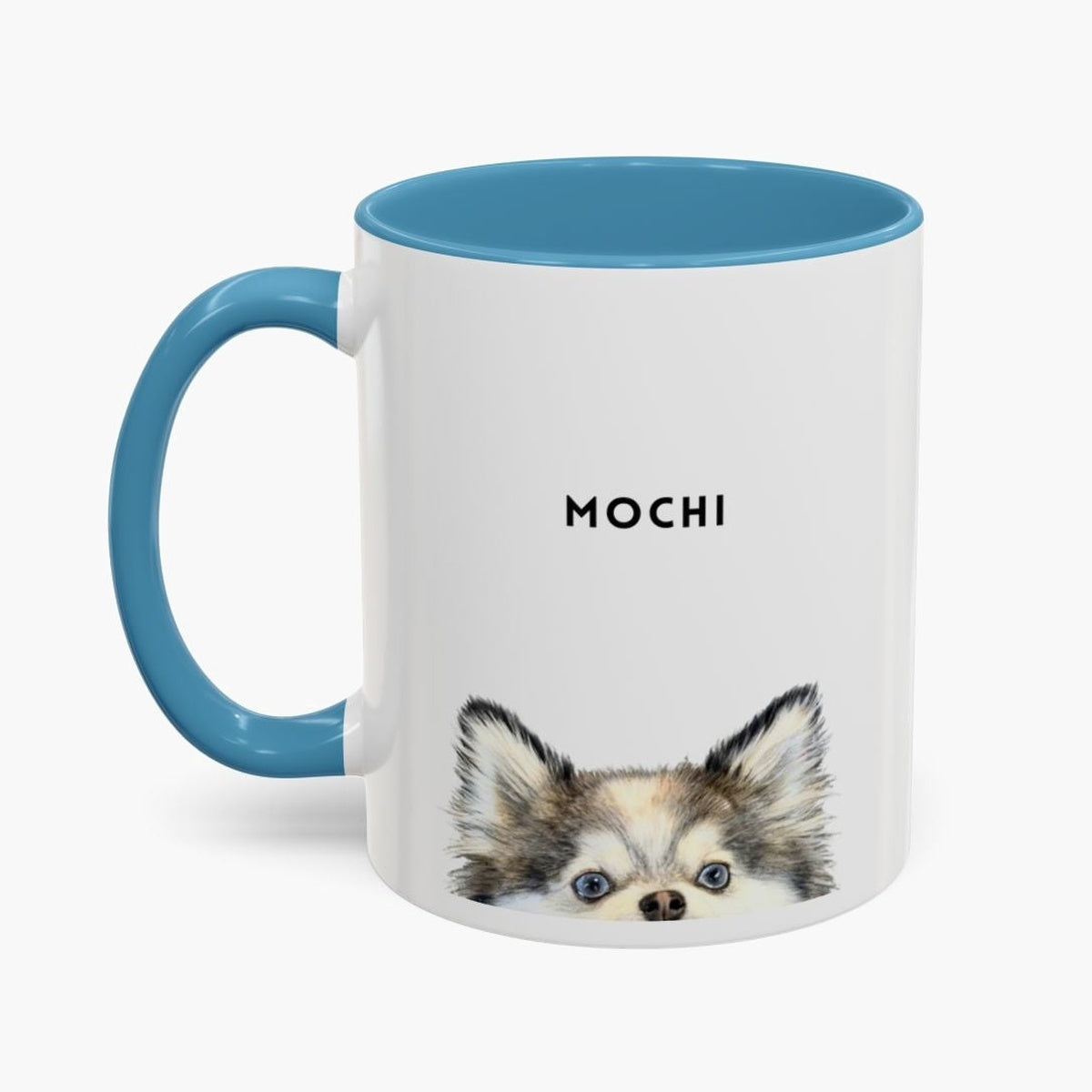 Watercolor long-haired chihuahua peeking up over the bottom edge of a white 11 oz mug with a light blue handle and inner glaze, name "MOCHI" above.