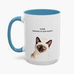 Watercolor Siamese cat wearing a gold halo on a taller white 15 oz mug with a light blue handle, lettered "CLEO" and "FOREVER IN OUR HEARTS".