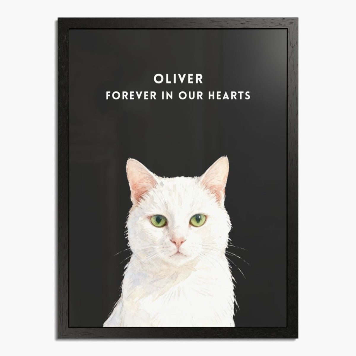Watercolor white cat portrait on a charcoal gray background in a black wood frame, with "OLIVER FOREVER IN OUR HEARTS" in white above.