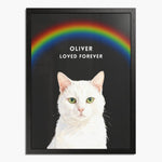 Watercolor white cat under an arched rainbow on a charcoal gray background, in a black wood frame; white text reads "OLIVER LOVED FOREVER".