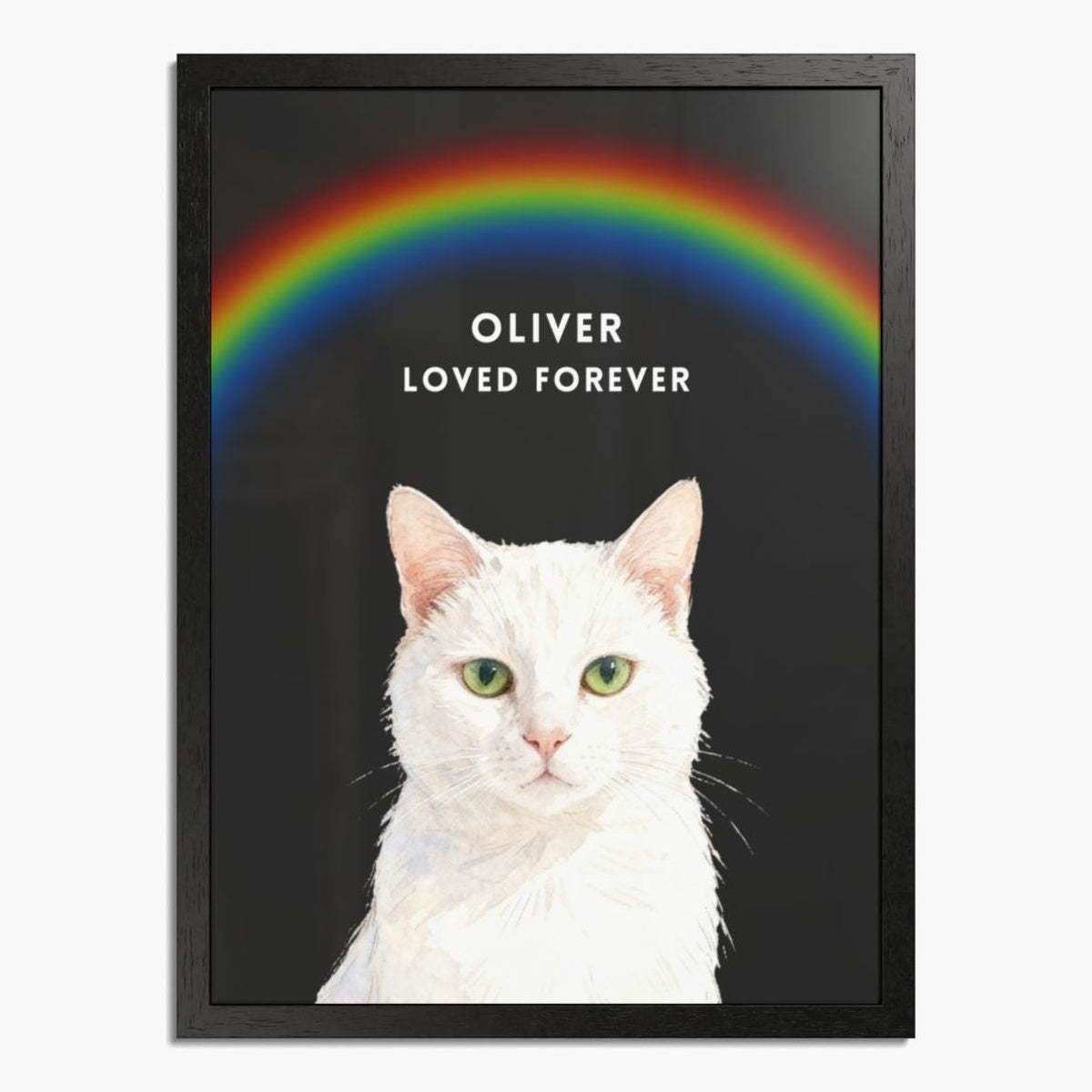 Watercolor white cat under an arched rainbow on a charcoal gray background, in a black wood frame; white text reads "OLIVER LOVED FOREVER".