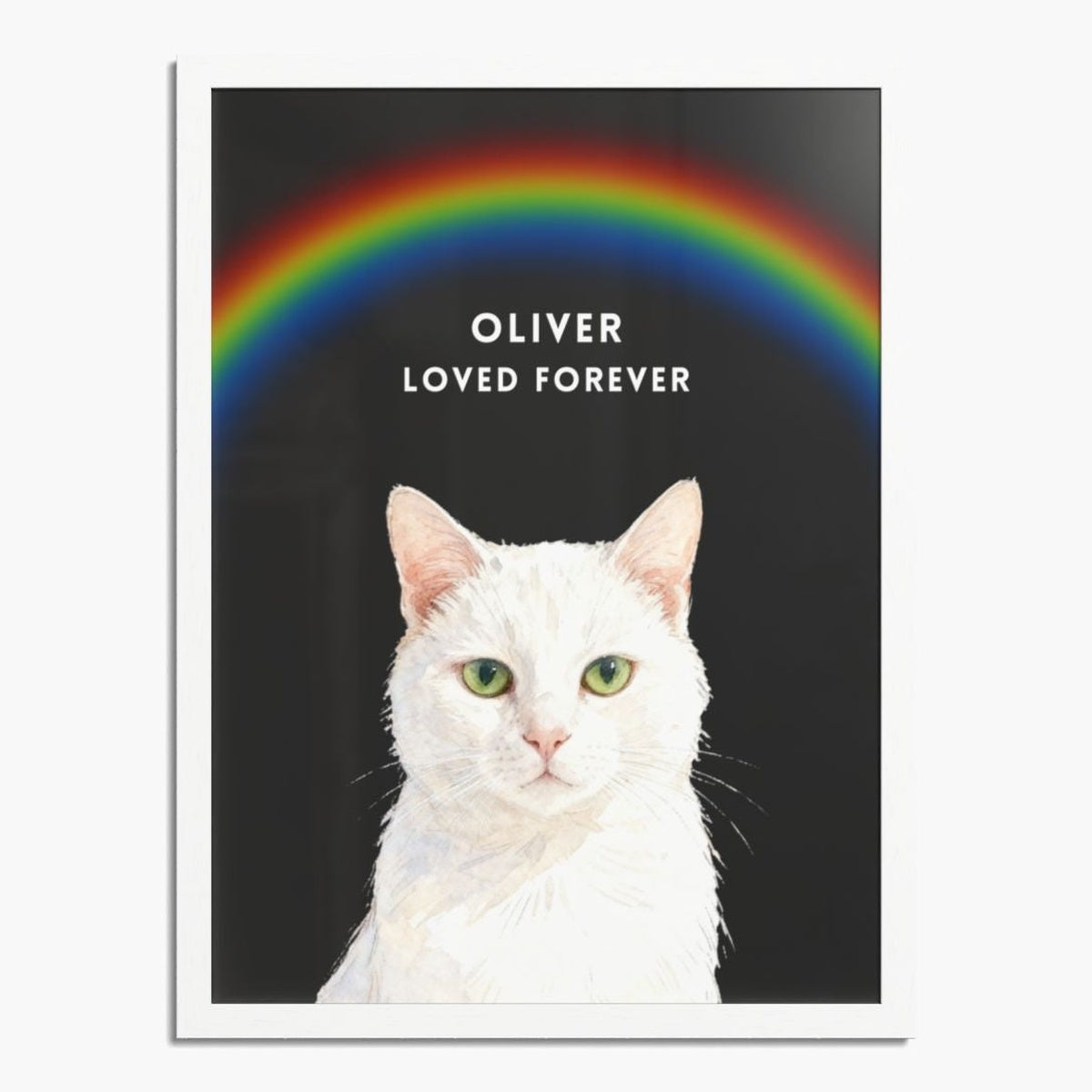 Watercolor white cat under an arched rainbow on a charcoal gray background, in a white wood frame; white text reads "OLIVER LOVED FOREVER".
