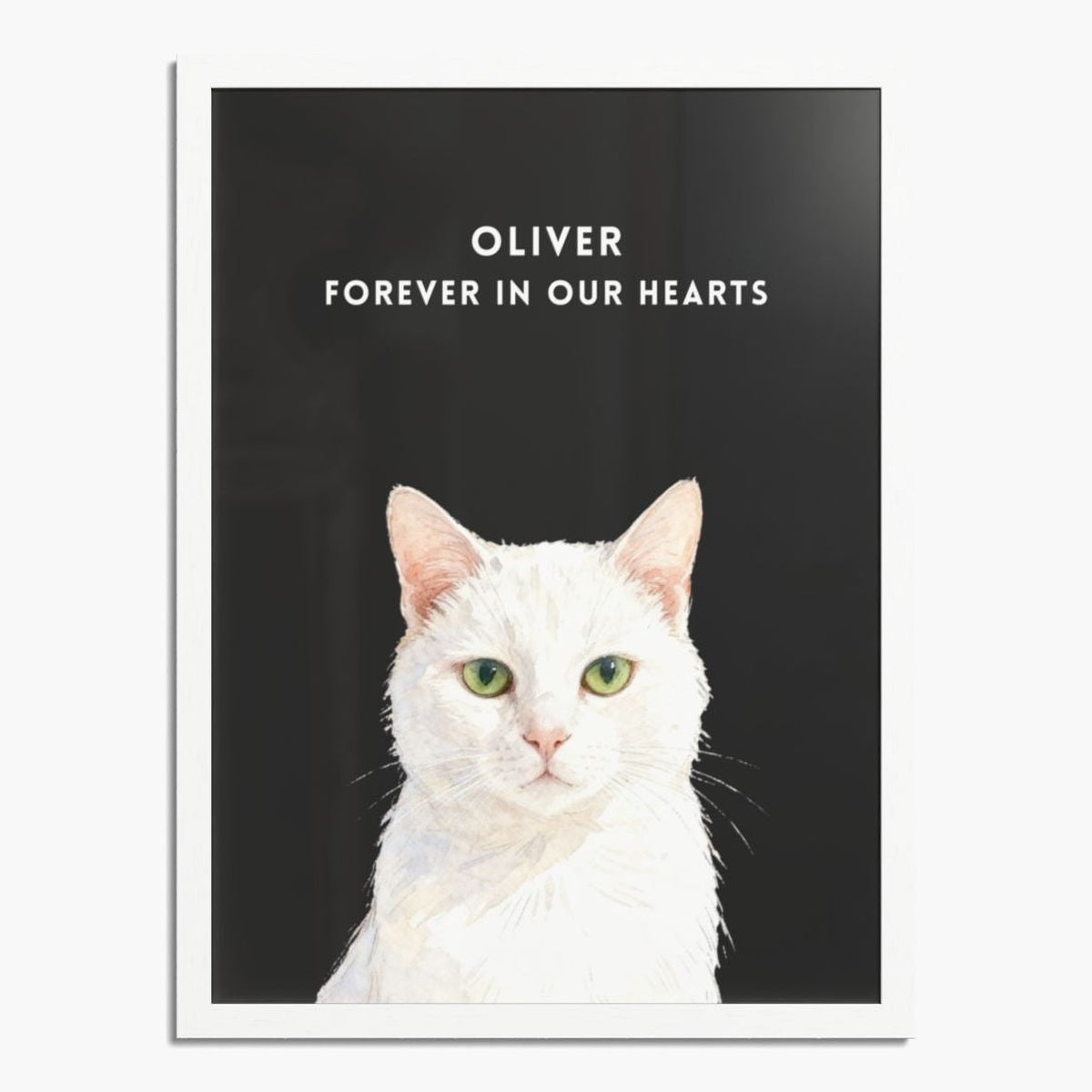 Watercolor white cat portrait on a charcoal gray background in a white wood frame, with "OLIVER FOREVER IN OUR HEARTS" in white above.